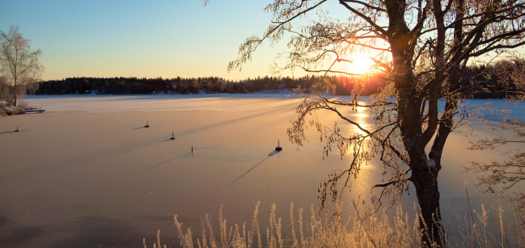 Solnedgång vid Larsmosjön på vintern